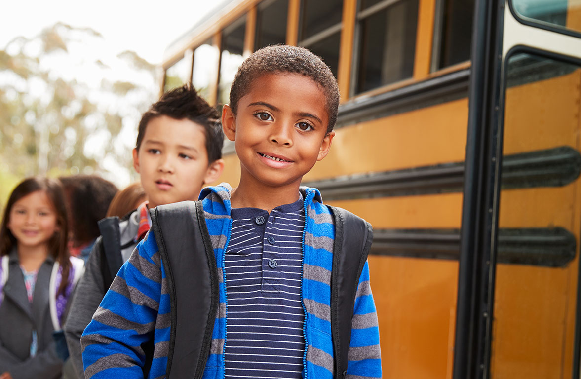 Children Loading Onto Schoolbus